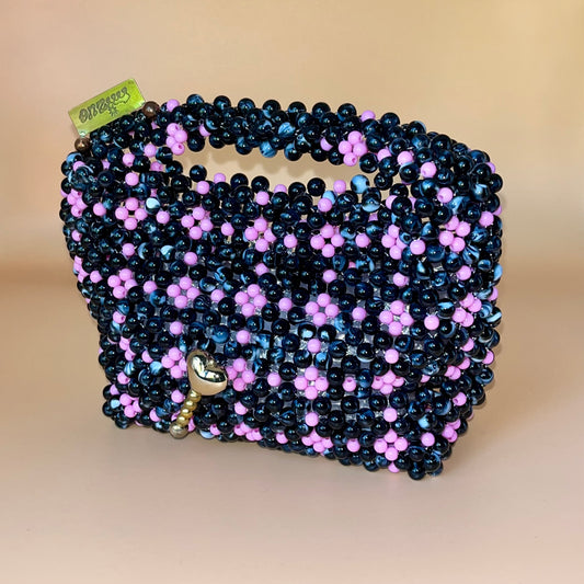 Handbag with charm