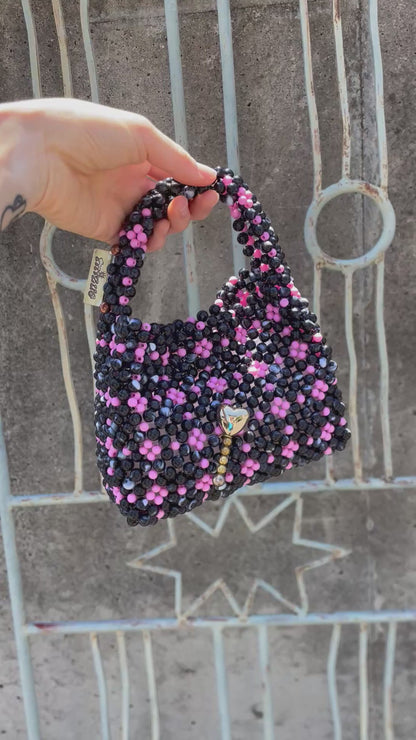 Handbag with charm